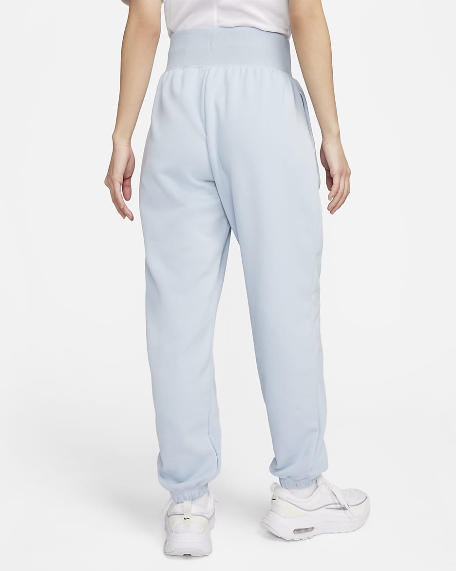 Nike longer length tracksuit bottoms online